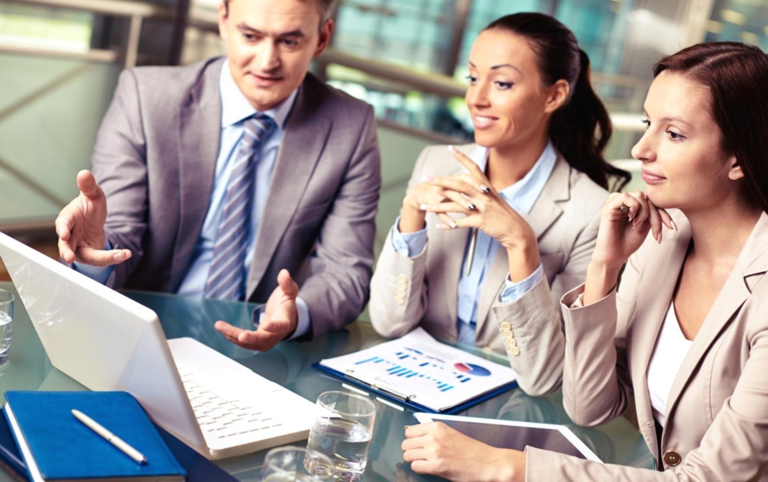 Professional meeting discussing investment strategies and partnership opportunities